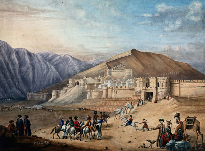 Horsemen assembled outside the city walls at Kabul, Afghanistan. Creator: Unknown.