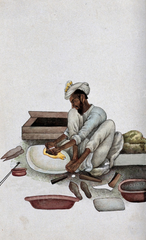 A shoemaker making slippers, (between 1800 and 1899?). Creator: Unknown.