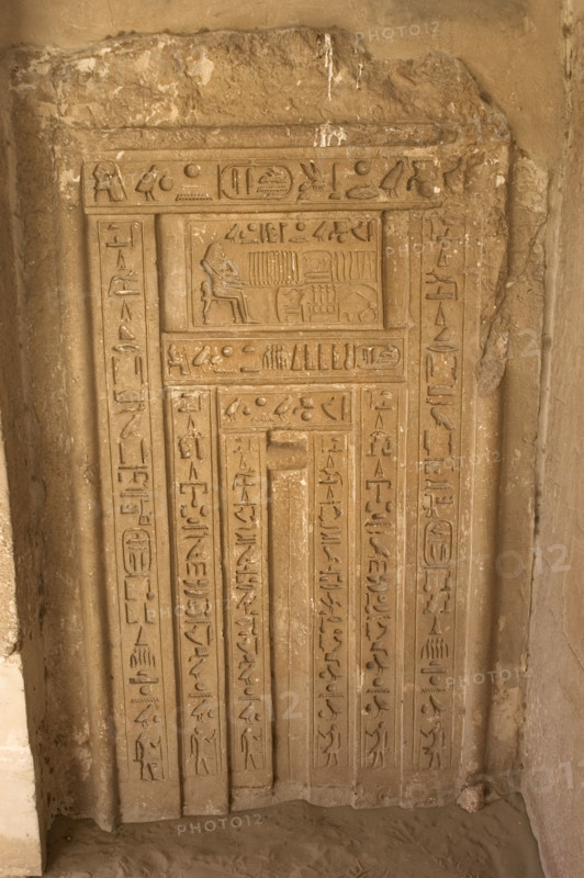 Hieroglyphic writing and deceased ofering food to the gods, Necropolis of Saqqara, Egypt, 2003. Creator: Unknown.