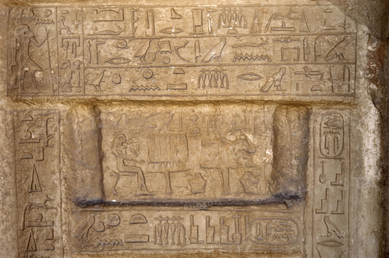 Hieroglyphic writing and deceased ofering food to the gods, Necropolis of Saqqara, Egypt, 2003. Creator: Unknown.