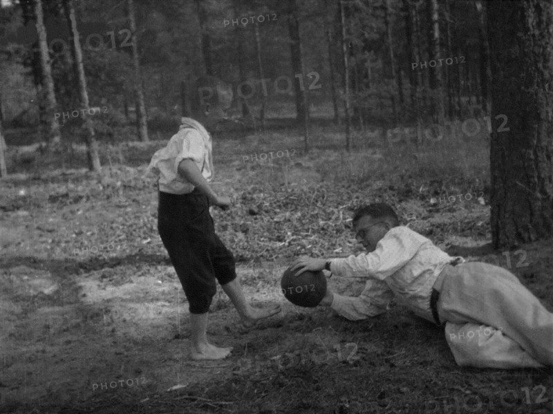 Dmitri Shostakovich plays football with his son Maxim in Komarovo, 1947. Creator: Varzar Shostakovich, Nina Vasilyevna (1909-1954).