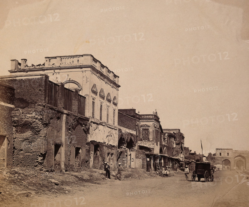India: a ruined street showing the house in which the king was confined, c1858. Creator: Felice Beato.