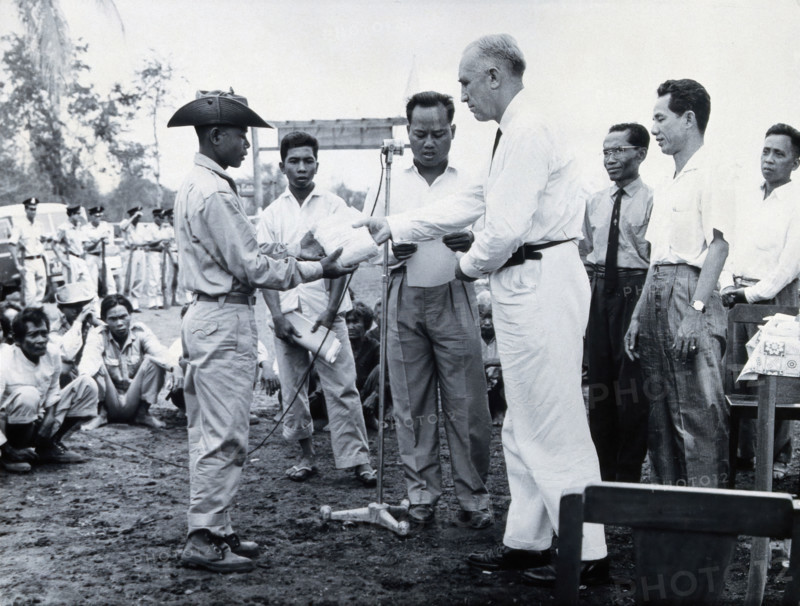 Fritz Ronnefeldt distributing medicine, c1940s. Creator: Unknown.