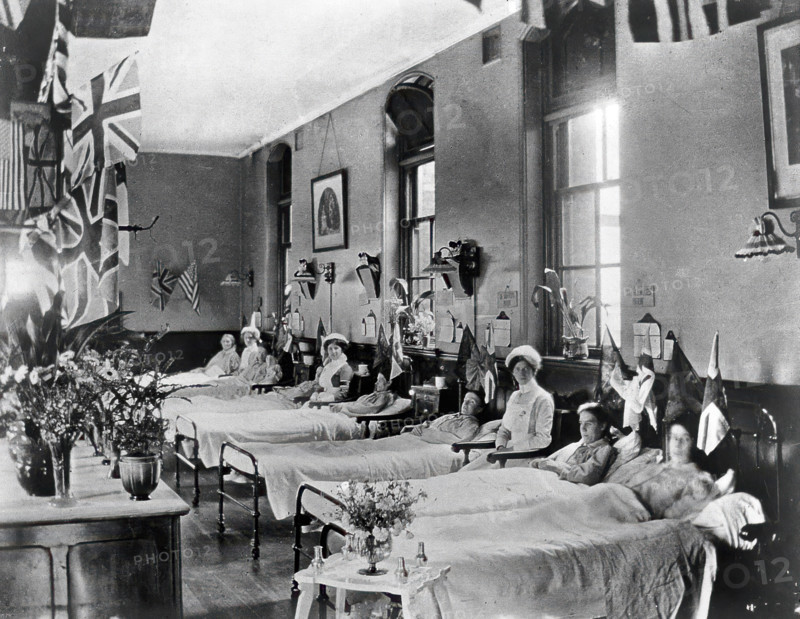 Hahnemann Hospital and Homeopathic Dispensaries, Liverpool: a women's ward, decorated..., [1910?]. Creator: Unknown.