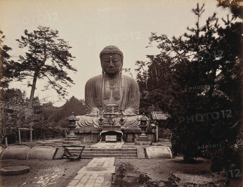 Kamakura, Japan: large statue of "Daibootz" or the "Great Buddha", in wooded country, c1873. Creator: William Pryor Floyd.