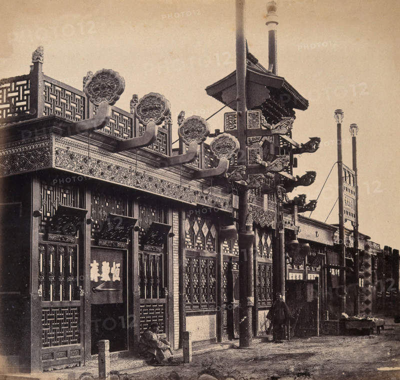 Beijing, China: an ornate shop exterior in the Chinese quarter. Creator: Felice Beato.