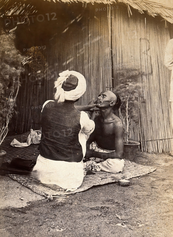 Man being shaved in one of the hospital camps, during the outbreak of bubonic plague..., 1897. Creator: Unknown.