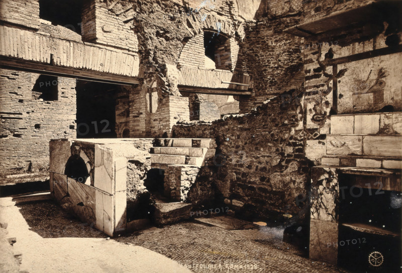 Partly ruined buildings in Ostia identified as a tavern or hot-food shop (thermopolium)..., 1928. Creator: Unknown.