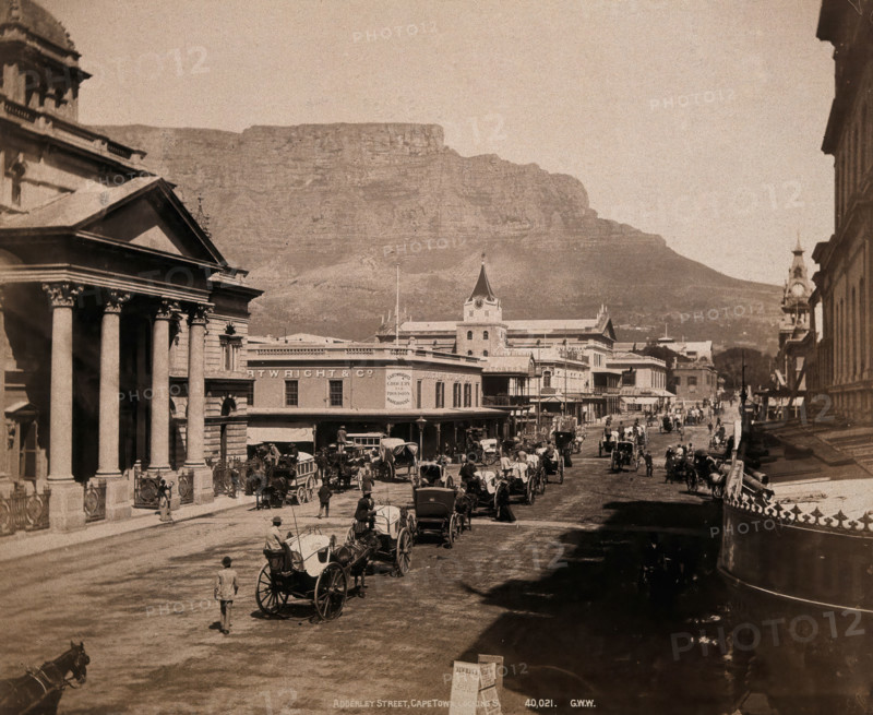 Cape Town, South Africa: horses and carriages on Adderley Street, with Table Mountain..., 1896. Creator: George Washington Wilson.