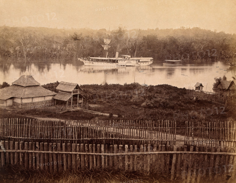 Malaya: steam yacht of the governor of the Straits Settlement on a Malaysian river, 1880. Creator: John Edmund Taylor.