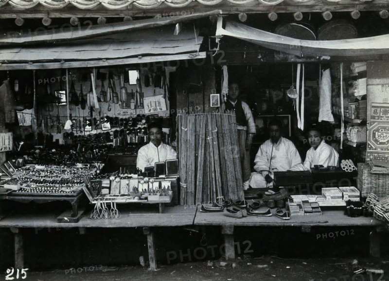 Two shops or market stalls, in Korea, c1900. Creator: Unknown.