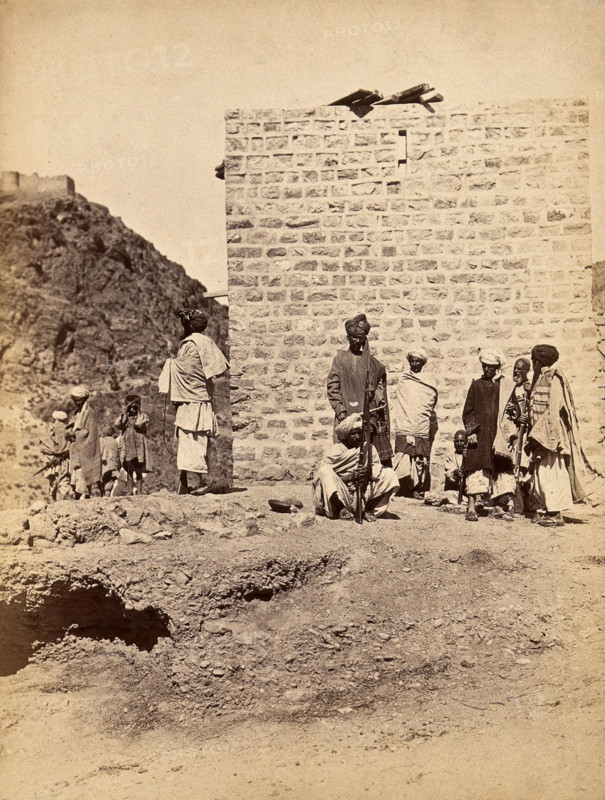 The Khyber Pass, Pakistan: men in a group with rifles, c1900. Creator: Unknown.