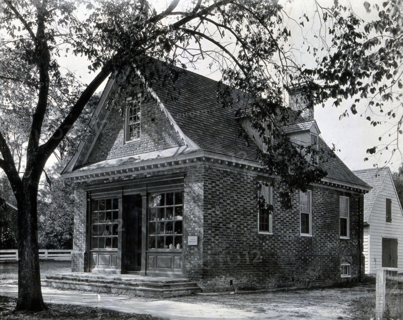 The exterior of a small brick building used as an apothecary shop..., c1900. Creator: Unknown.