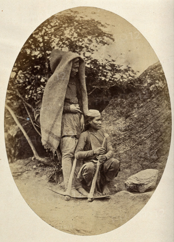 Nepal: two Tibetan men with pick-axes, c1860. Creator: Clarence Comyn Taylor.