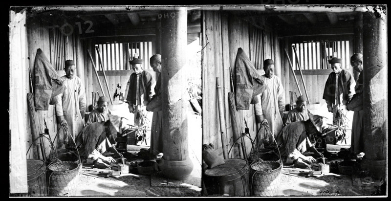 Foochow (Fuzhou), Fukien province, China: a coppersmith at work in his shop, 1871. Creator: John Thomson.