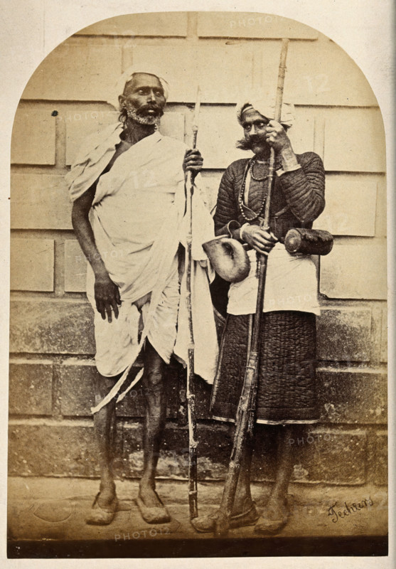 Oude, India: two men holding long sticks, c1860. Creator: Unknown.