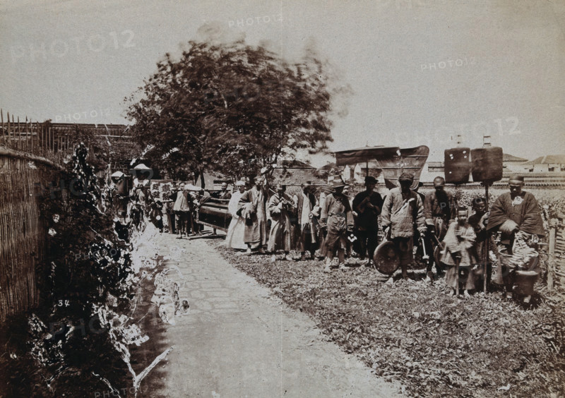 Shanghai, China: a funeral procession, with people carrying banners, c1880s Creator: Unknown.