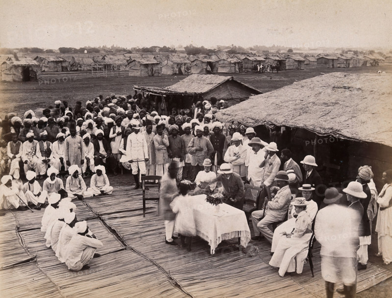 Discharged hospital patients after bubonic plague outbreak, being given relief money..., 1897. Creator: Unknown.