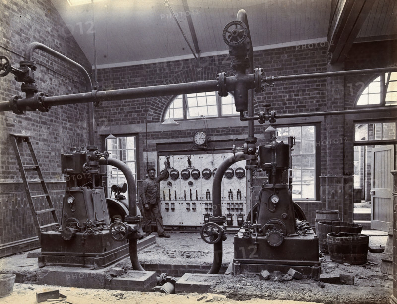 Johannesburg Hospital, South Africa: member of staff, possibly in the boiler room, c1905. Creator: Unknown.