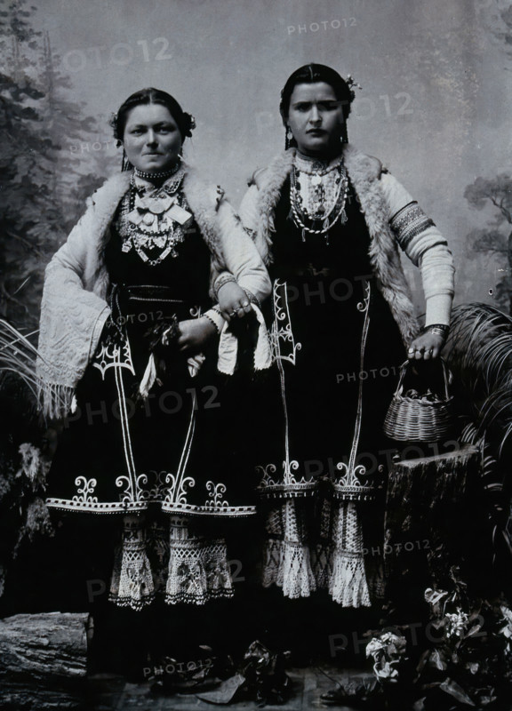 Two Bulgarian women arm-in-arm wearing national dress, c1900. Creator: Unknown.