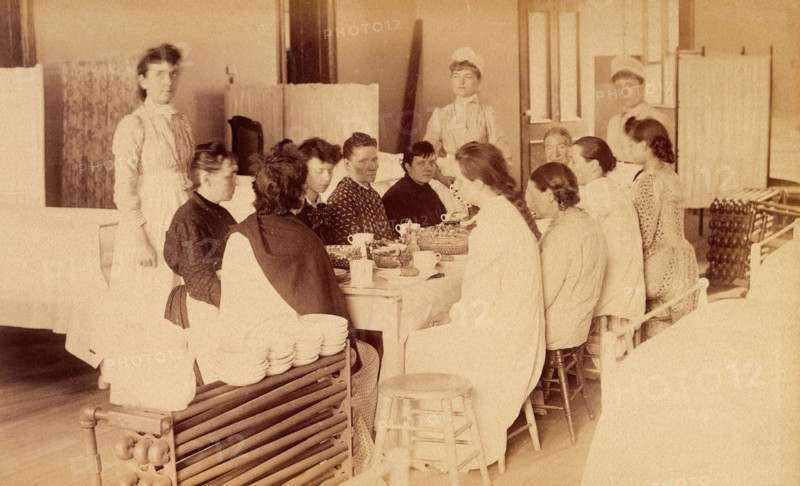 Bellevue Hospital, New York City: women patients (mentally ill?) having a meal..., 1885-1898. Creator: Unknown.