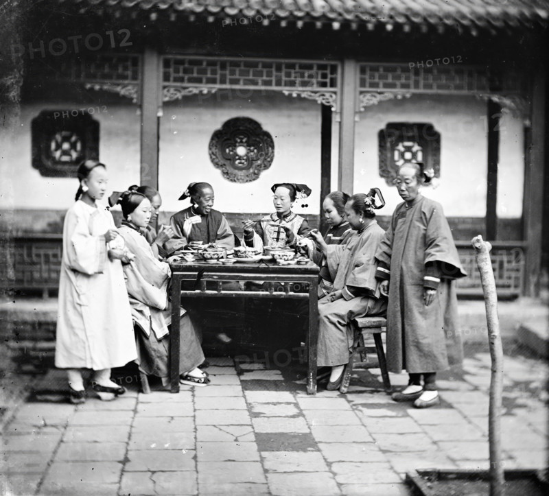 Peking, Pechili province, China: Manchu ladies at a meal table, 1869. Creator: John Thomson.
