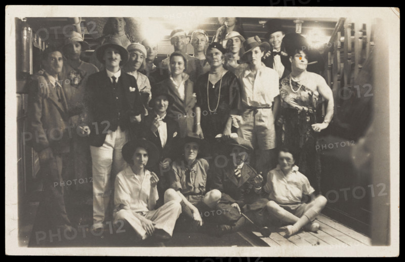 Passengers on RMS Armadale Castle, some in drag, pose for a group portrait, 1933. Creator: Unknown.