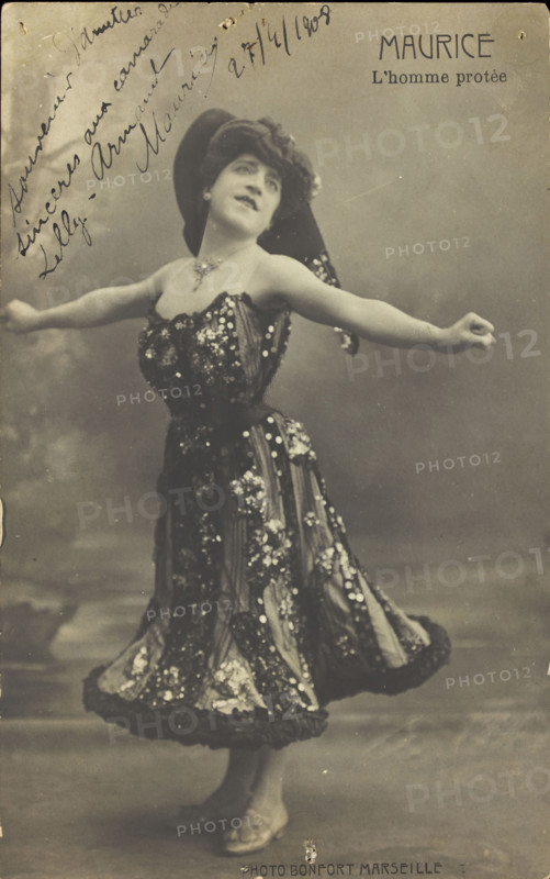 An actor in drag, known as "Maurice"; poses on stage mid-dance, 1908. Creator: Unknown.