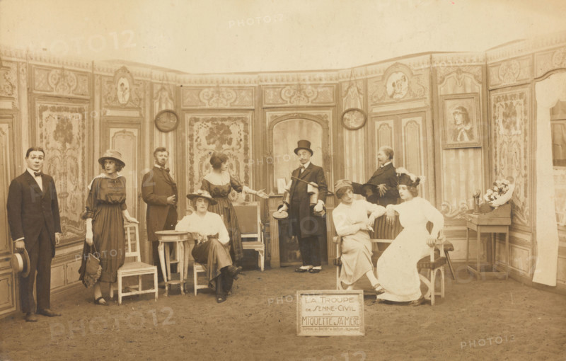 Prisoners of war, some in drag, posing on stage in 'Miquette et sa mere' at..., (1910-1919?). Creator: Unknown.