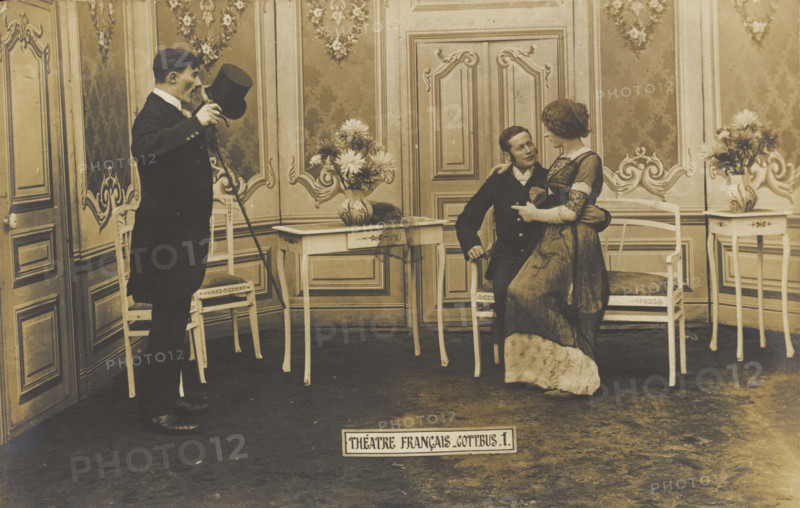 French prisoners of war, one in drag, performing a show at a prisoner of war camp in...(1910-1919?). Creator: Unknown.
