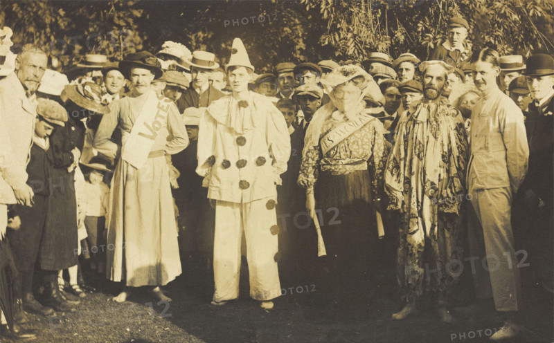 People at Rickmansworth, Herts, some in drag, gather outside at a swimmming gala, 1908. Creator: Unknown.