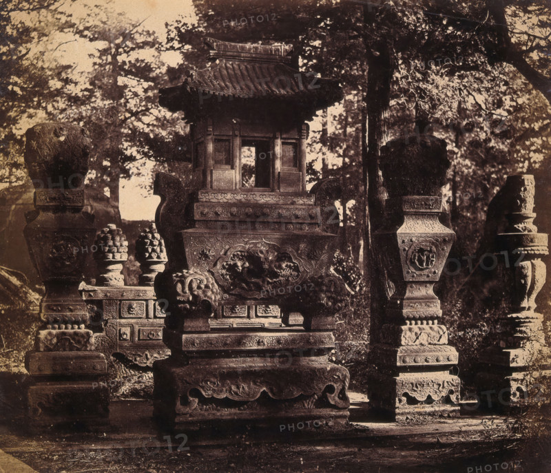 Near Beijing, China: interior of a tomb showing ornate monuments, 1860. Creator: Felice Beato.