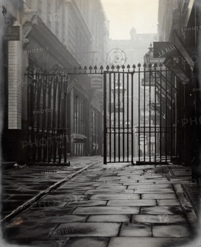 The church of St Bartholomew the Great and surrounding area; iron gates leading to..., 1909 Creator: GW Miller.
