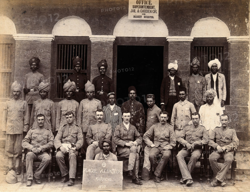 Staff who work in the jail or gardens for the Karachi Plague Committee, India, 1897. Creator: Unknown.
