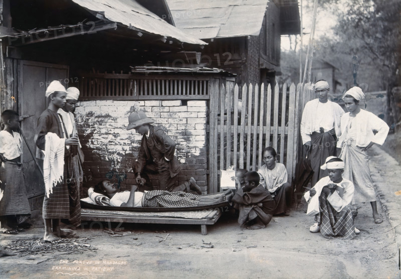 An outdoor examination of a plague patient in Mandalay, 1906. Creator: Unknown.