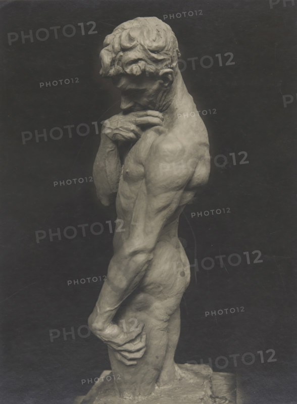 Male nude covering his chin with his right hand, 1920.  Creator: Unknown.