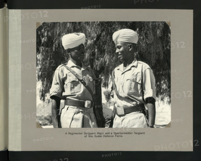 A Regiment Sergeant Major and a Quartermaster Sergeant of the Sudan Defence Force, 1964. Creators: Colonial Office, Unknown.