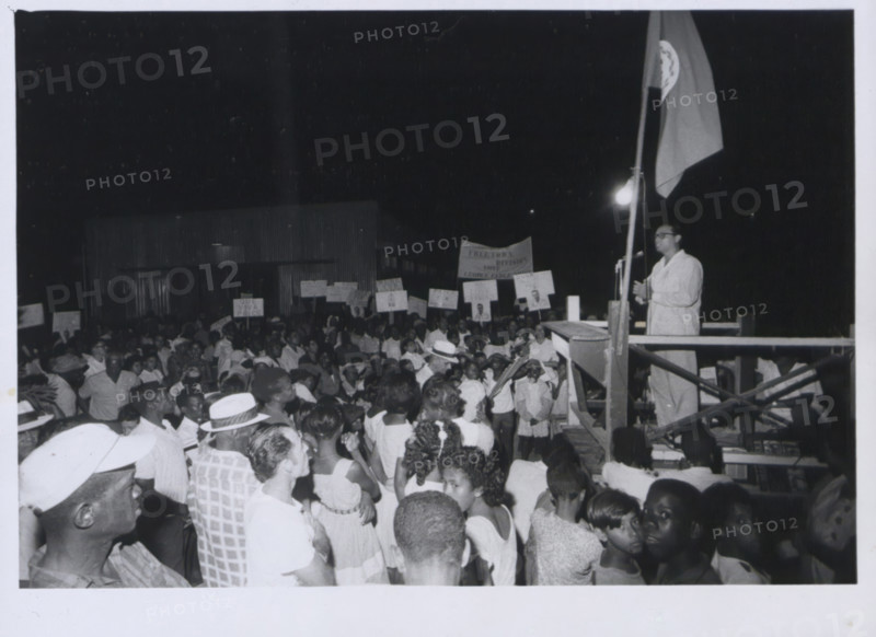 George Price, Prime Minister of British Honduras, addressing the crowd, March 1965. Creator: Unknown.