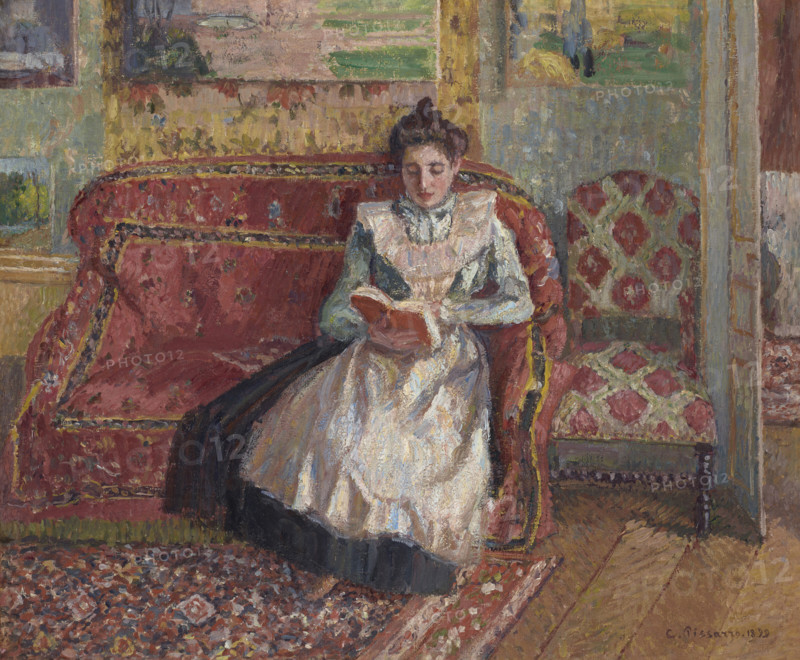 Jeanne Pissarro, dite Cocotte, lisant, 1899. Creator: Pissarro, Camille (1830-1903).
