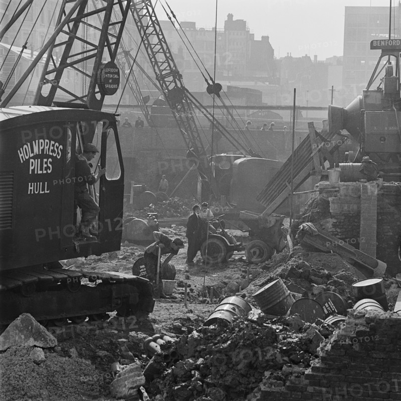 A crane at work on the post-war redevelopment of the Barbican Estate, London, 1962-1964. Creator: John Gay.