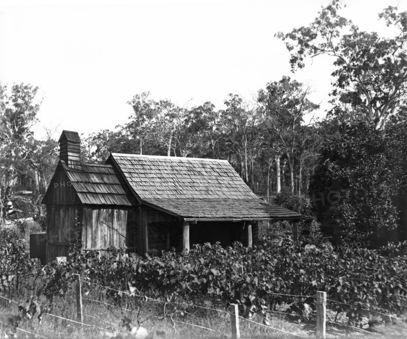 Australian wooden slab hut, wooden shingle roof, c1900s. Creator: Robert Augustus Henry L'Estrange.