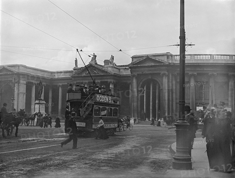 Street scene with electric tram in front of old Irish Paliament building, Dublin, Ireland, c1895. Creator: Robert Augustus Henry L'Estrange.