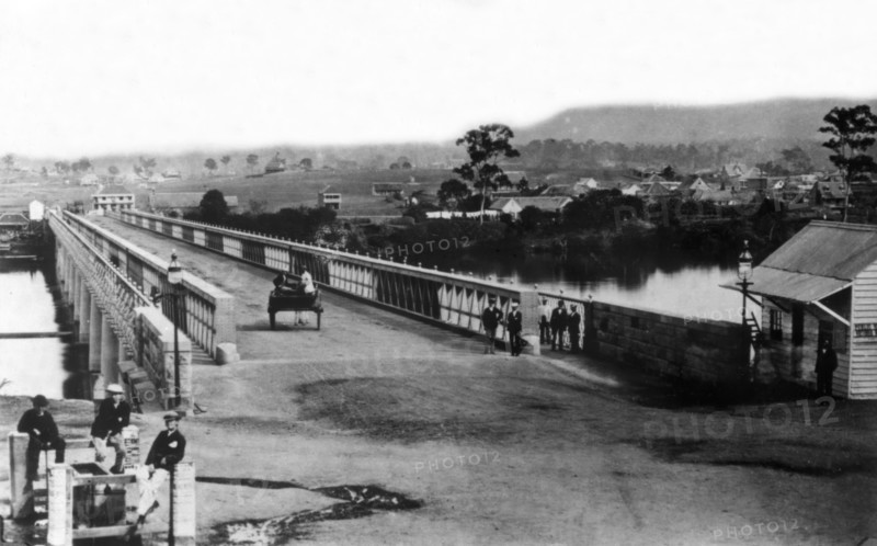 Crossing the first permanent Victoria Bridge, Brisbane, c1874. Creator: Unknown.