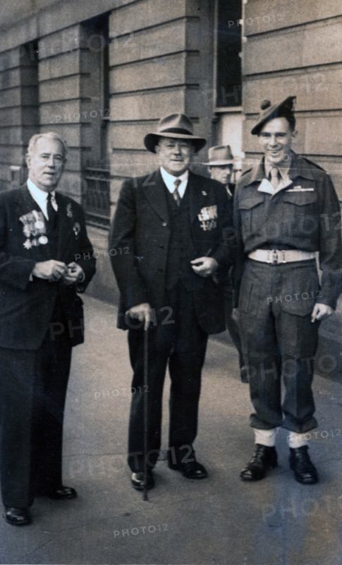 Captain Frank Page MC (centre), Anzac Day march, year unknown. Creator: Unknown.