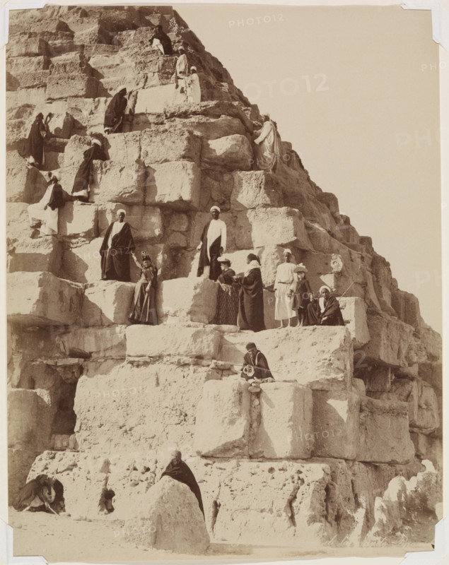Posing for Pictures on the Great Pyramid at Giza, between 1860 and 1900. Creator: Zangaki.