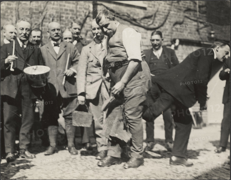 'Shoeing the Colts' ceremony during the Hocktide Festival in Hungerford, West Berkshire, 1925-1935. Creator: George R Long.