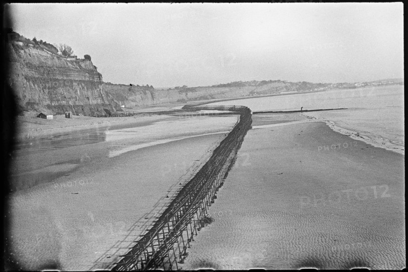 View looking north-east from Shanklin Beach, showing Admiralty scaffolding, Isle Of Wight, 1945. Creator: George R Long.