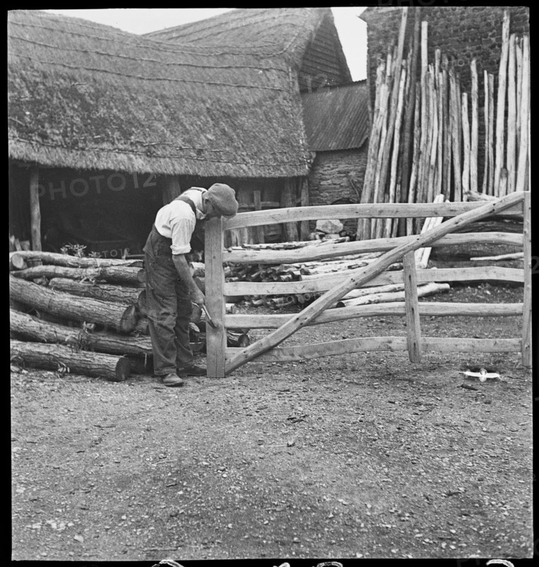 Man making a field gate in the village of Aston, Cote, Shifford and Chimney, Oxfordshire, 1930-50. Creator: George R Long.