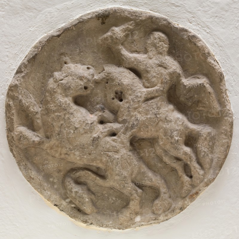 Roundel with Horsemen in Combat with a Feline Animal, between 12th and 13th century. Creator: Unknown.