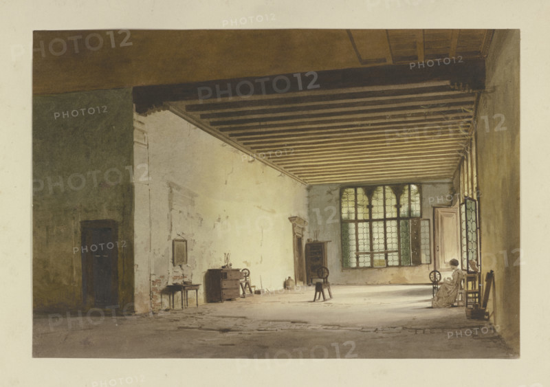 Spacious, sparsely furnished room with three spinning wheels, a spinner at work to the..., c1851. Creator: Carl Theodor Reiffenstein.